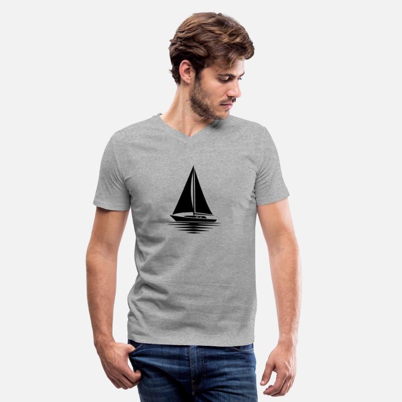Calm Water With Sailboat And Sails Set