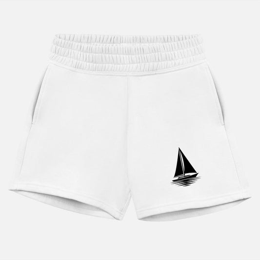 Sailboat With Sails Set And Calm Sea