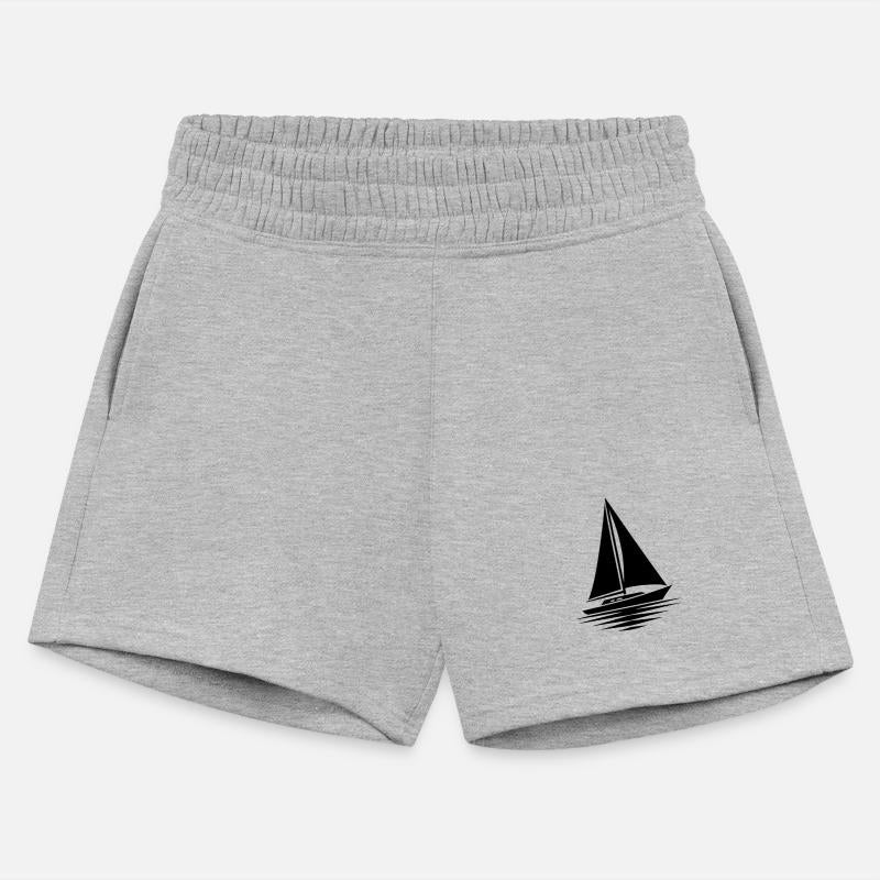 Sailboat With Sails Set And Calm Sea