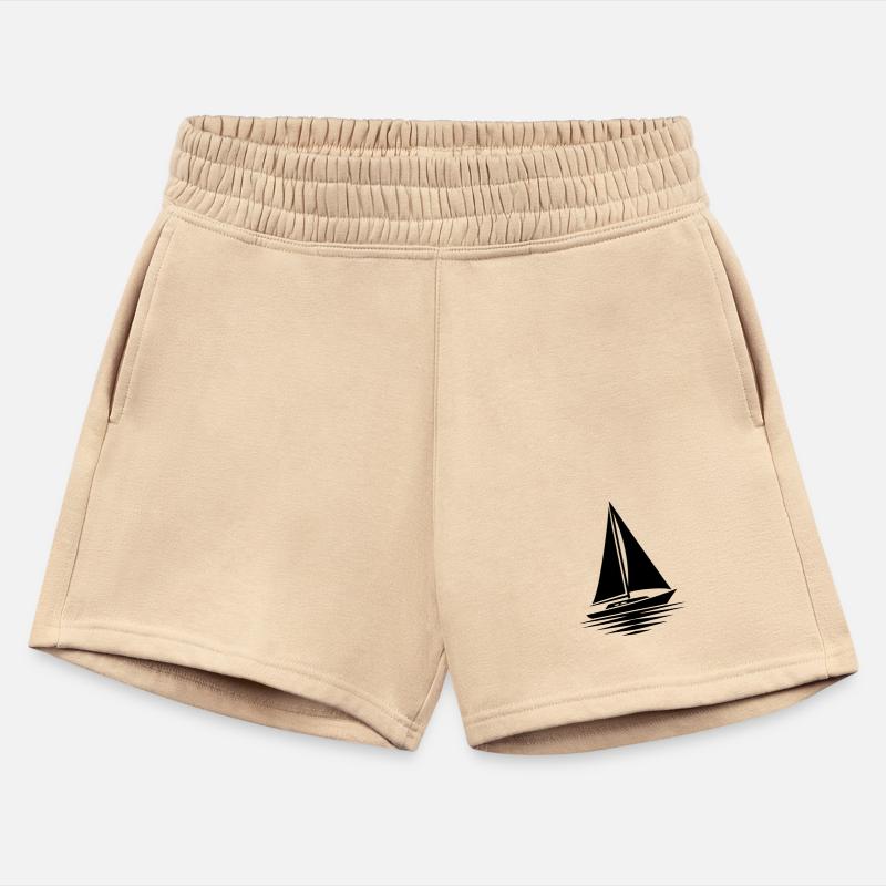 Sailboat With Sails Set And Calm Sea